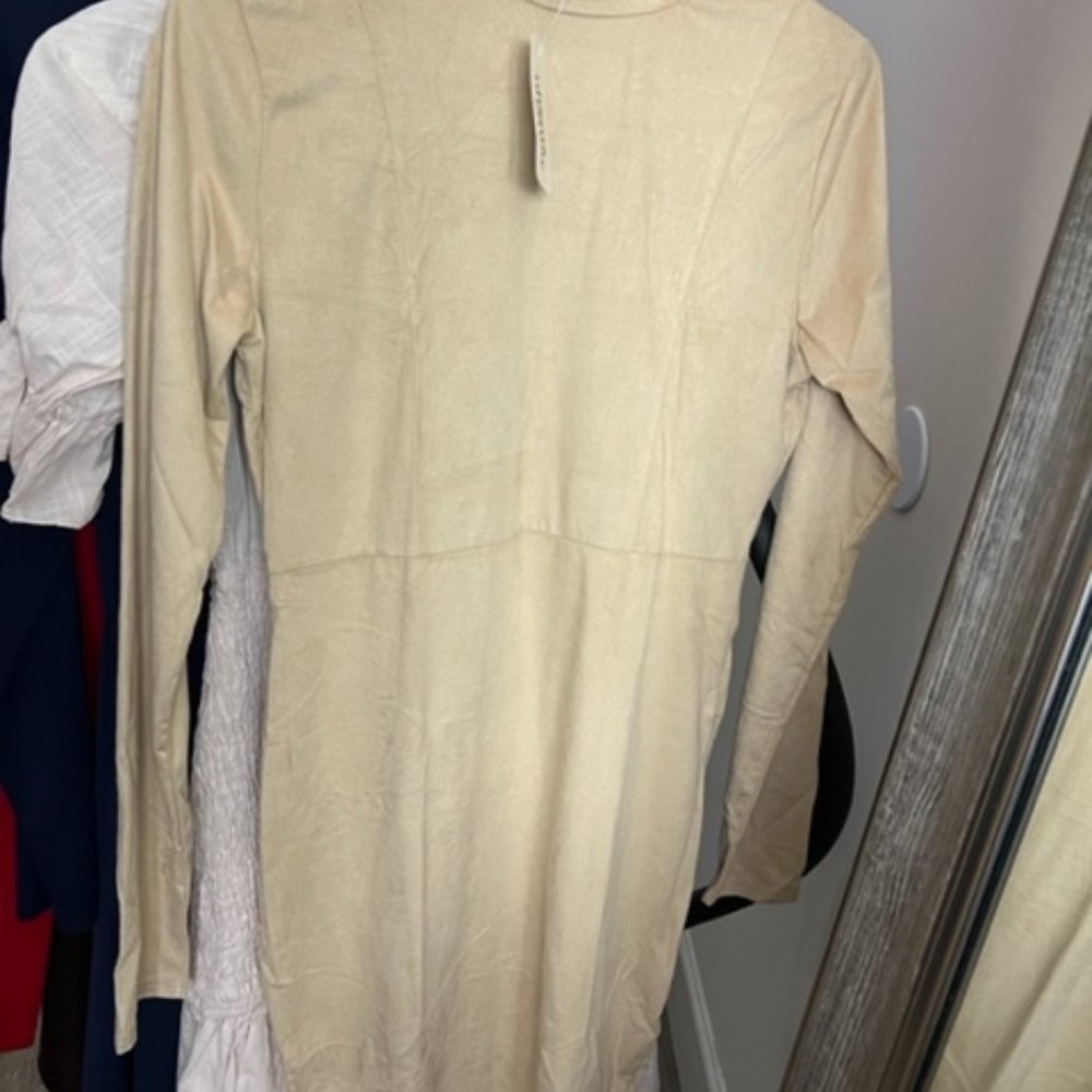 Long sleeve. Mini body con. Size Small. Cream Color Suede like feel.